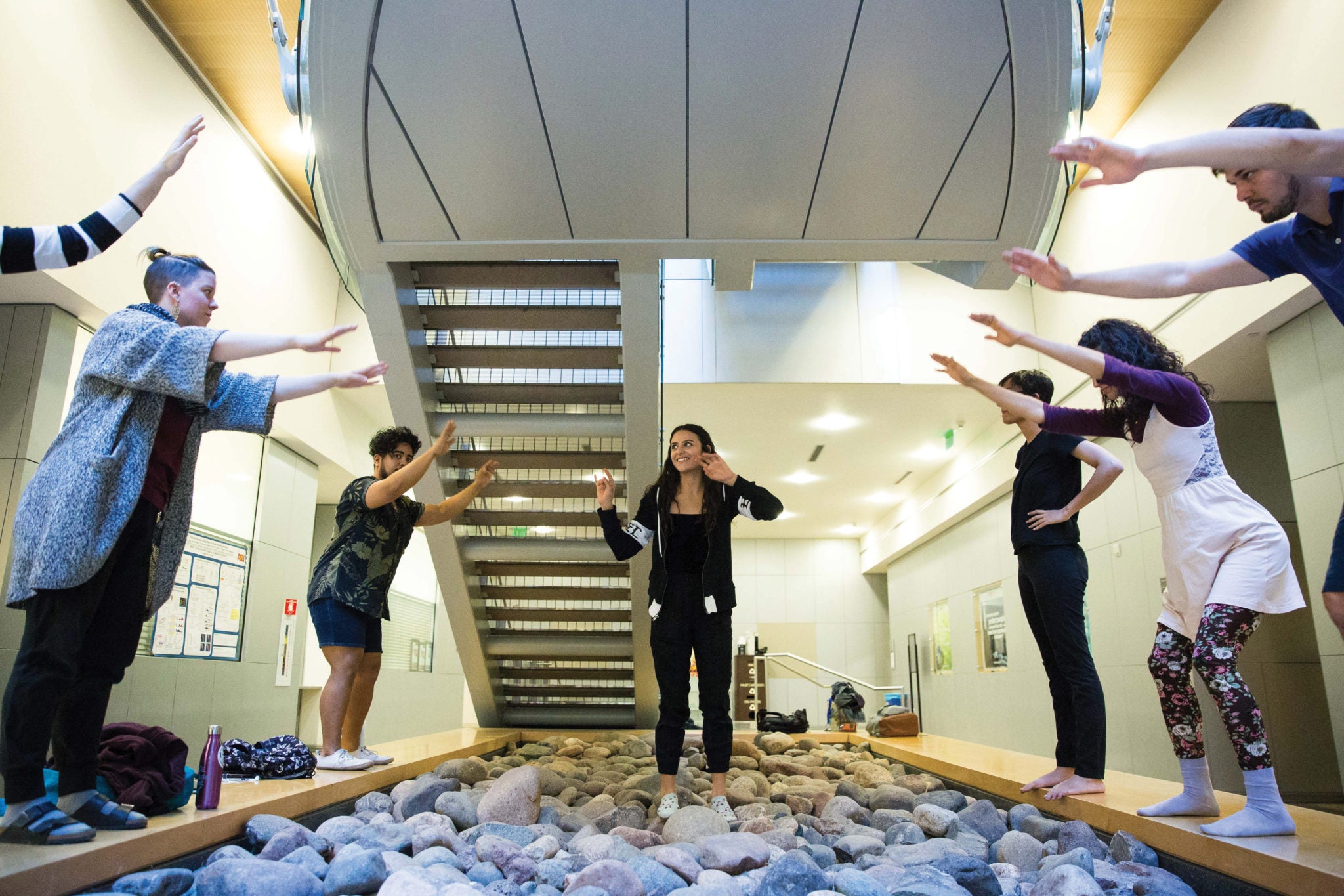 Dancer Tiffany Velazquez walks through possible movements of her dance