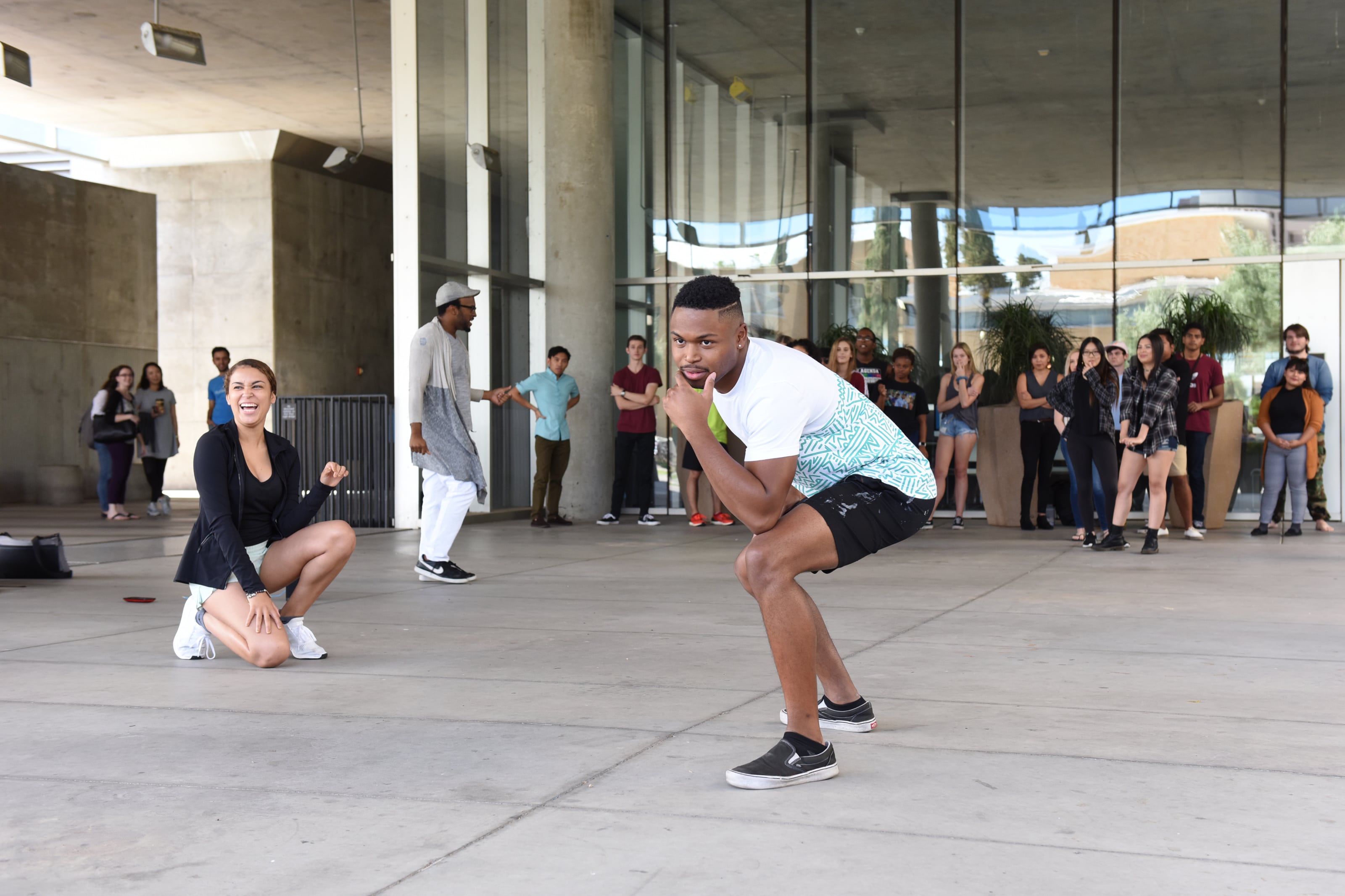 student strikes a pose during dance event